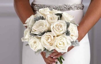 White roses and silver dusty miller