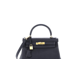 Hermes Kelly handbag Noir Togo with gold.