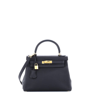Hermes Kelly handbag Noir Togo with gold.